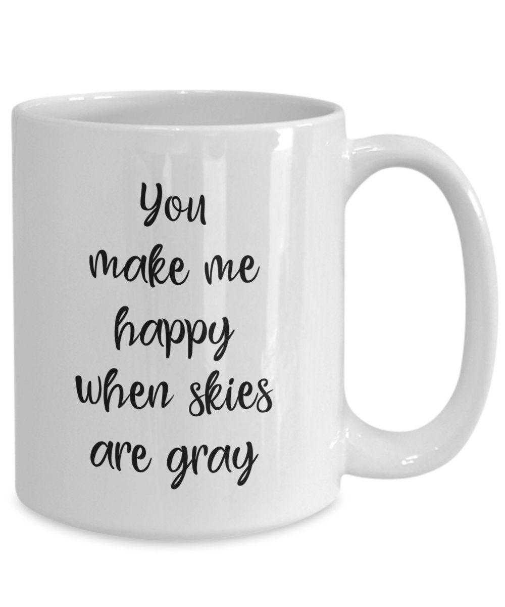 Kaffeebecher mit Aufschrift"You make me happy when skies are gray"