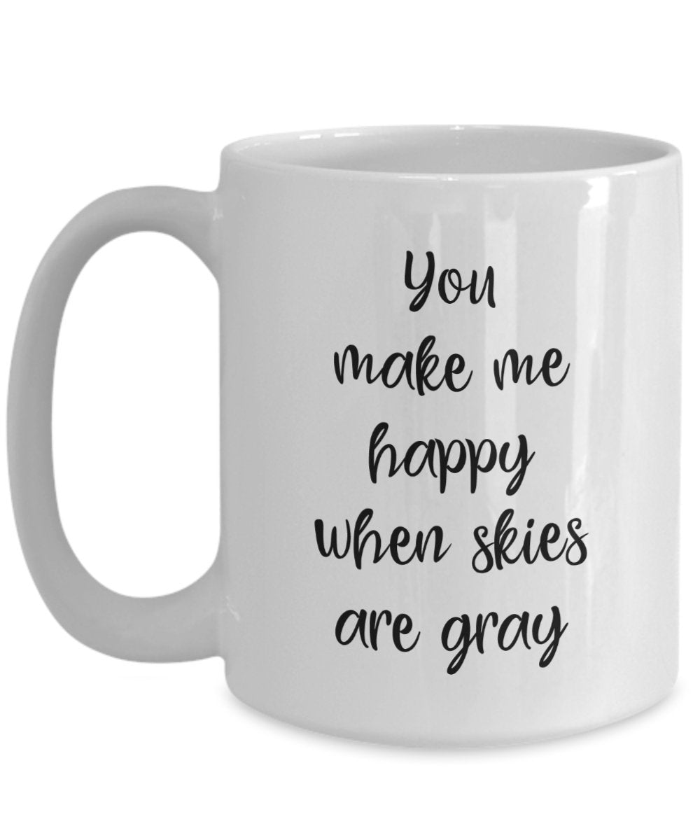 Kaffeebecher mit Aufschrift"You make me happy when skies are gray"